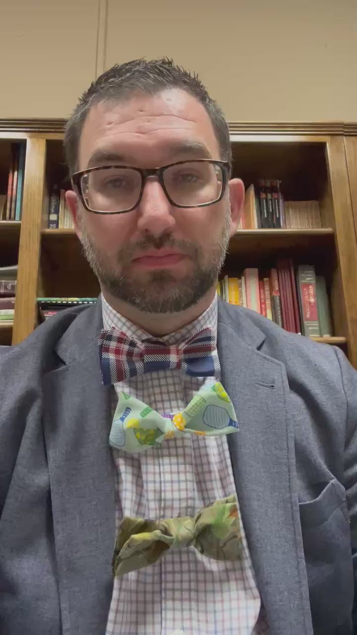 Load video: Joey shows how easy it is to put on and take off a Bowtize bow tie!